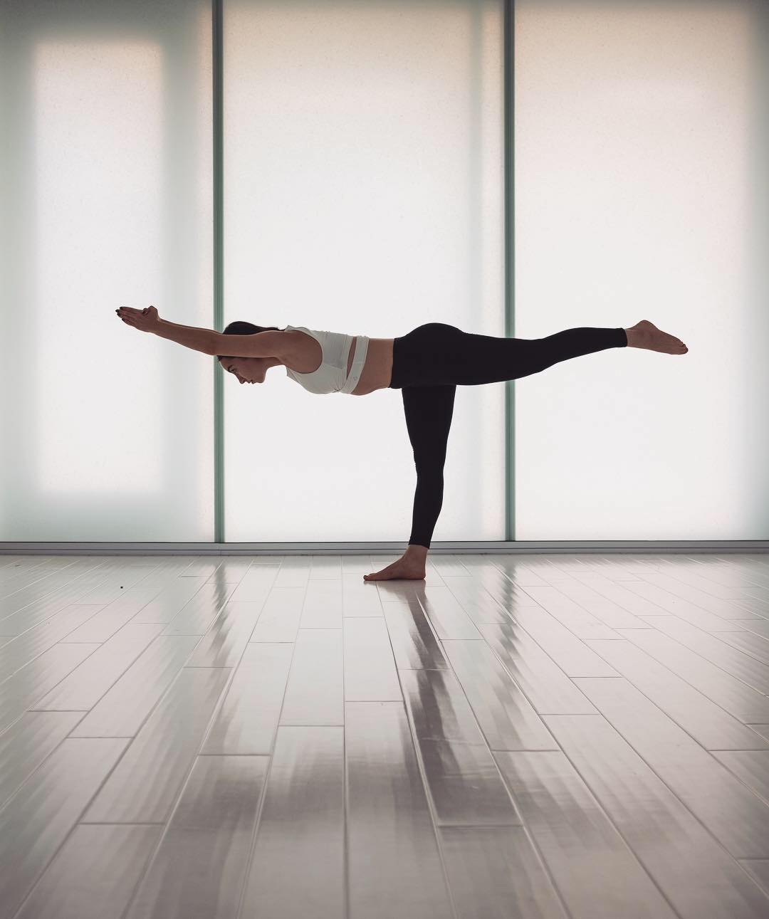 7-Balancing-Stick-Pose-5-Ksenia-Kolieva