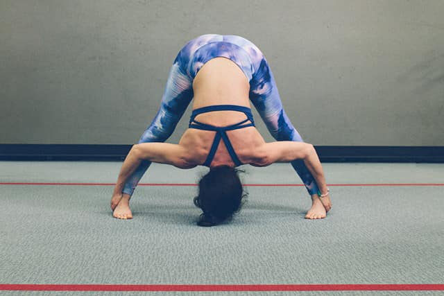 8-Standing-Separate-Leg-Stretching-Pose-8-Christina-Watt-Englesby