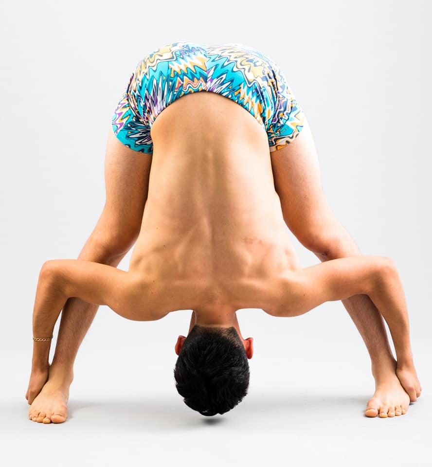 8-Standing-Separate-Leg-Stretching-Pose-9-Vaxal-Bikram